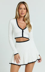Naomi Two Piece Set - Contrast Knit Button Up Long Sleeve And Pleated Mini Skirt in Cream