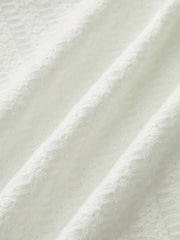 Denim-Trimmed Knit Mini Skirt with Metal Button