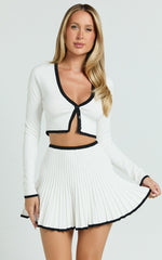 Naomi Two Piece Set - Contrast Knit Button Up Long Sleeve And Pleated Mini Skirt in Cream