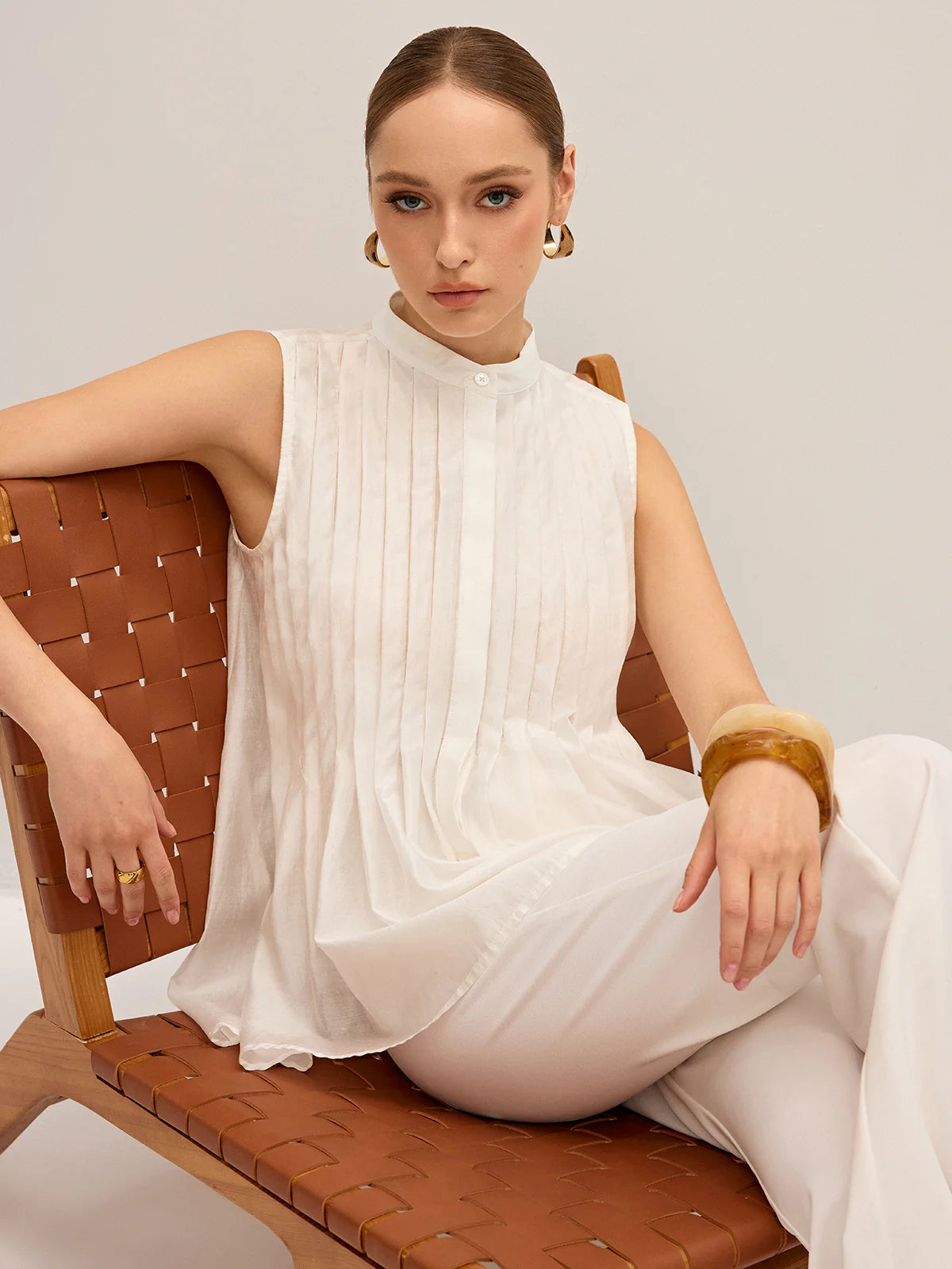 Semi-Sheer Pleated Mock Neck Blouse