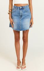 Adan Mini Skirt - Recycled Cotton Frayed Hem Denim Skirt in Mid Blue Wash